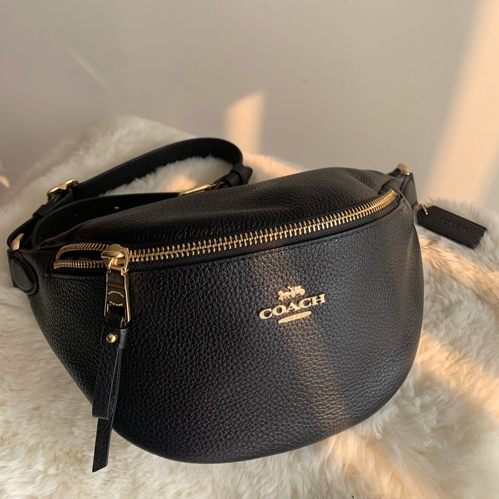 COACH's fanny pack finished in pebble leather.